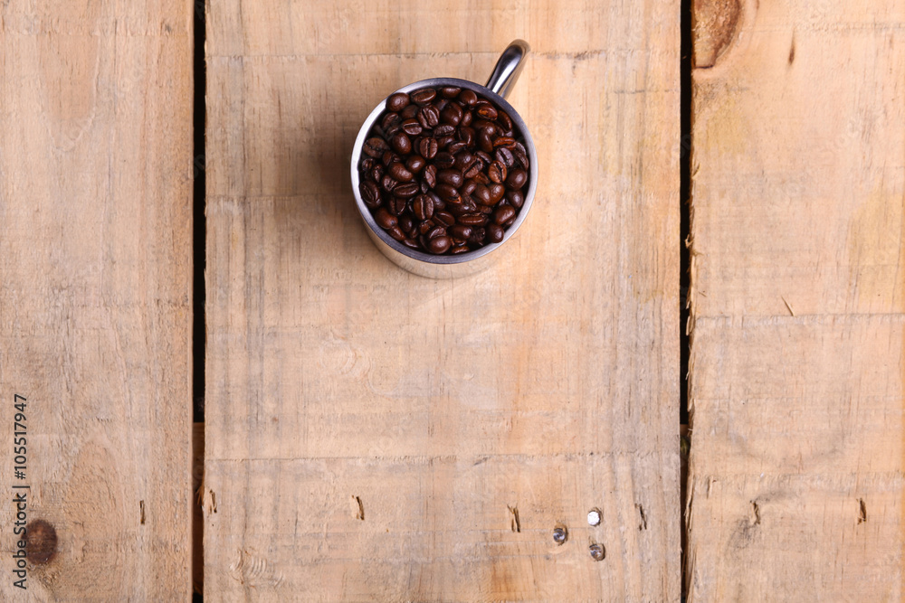 Coffee beans in a mug Coffee beans in a mug