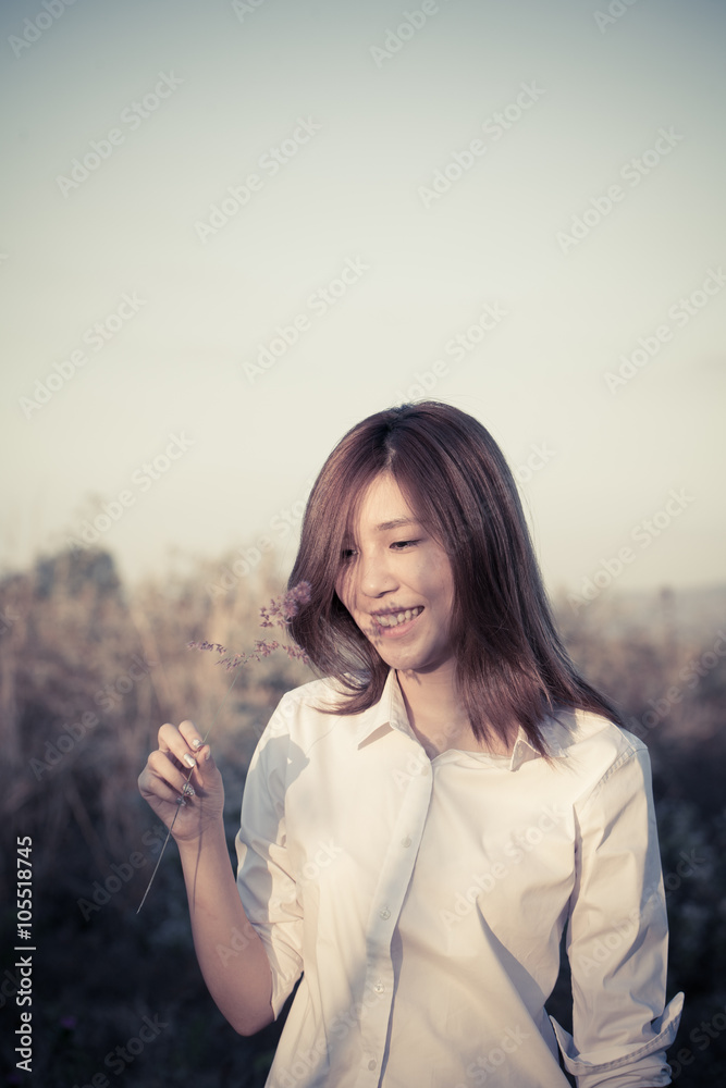 sweet girl, sweet young girl playing in grass field with sun light sweet girl, sweet young girl playing in grass field with sun light