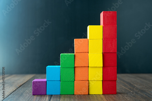 Фотография Colorful stack of wood cube building blocks