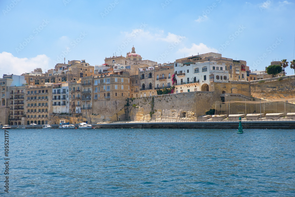 The view of Senglea residential houses from the water of Dahla t