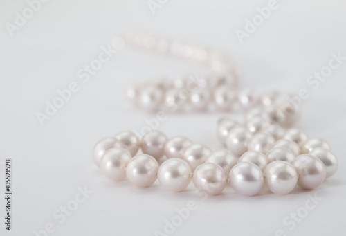  Pearl necklace on white background