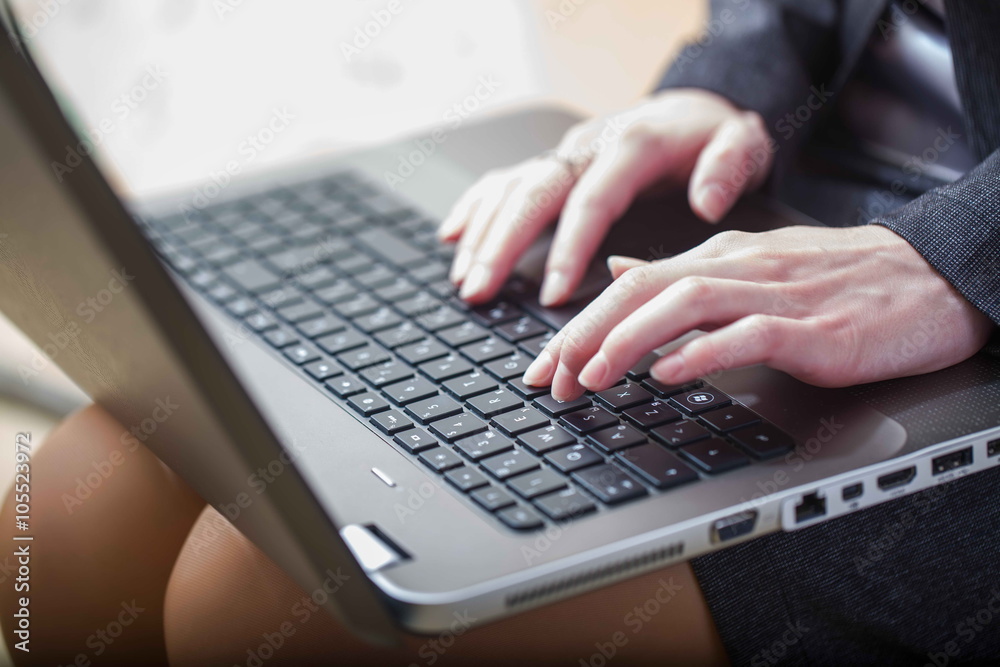 business woman working laptop on his lap business woman working laptop on his lap