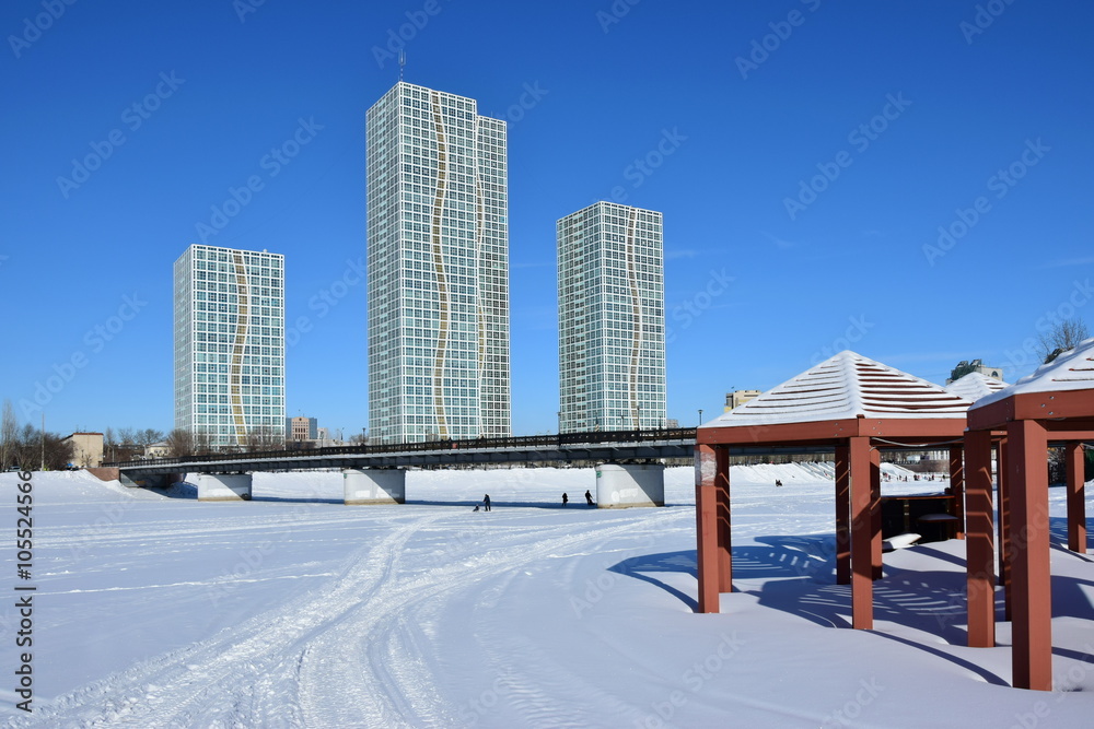 Street view in Astana, Kazakhstan, in winter, with residential towers called GRAND ALATAU Street view in Astana, Kazakhstan, in winter, with residential towers called GRAND ALATAU