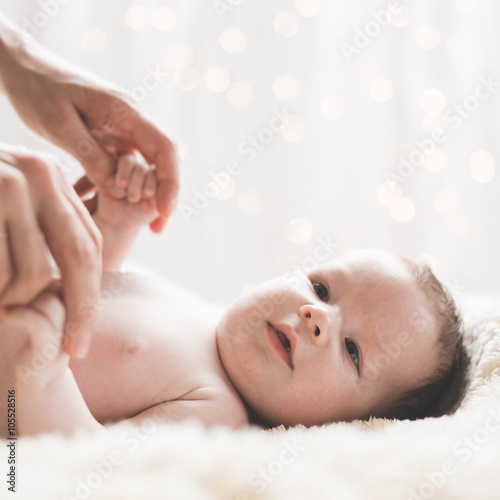 Infant and mom s hands