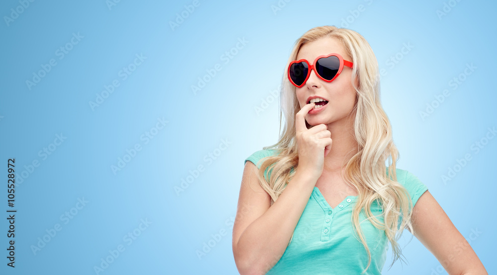 happy young blonde woman or teenager in sunglasses happy young blonde woman or teenager in sunglasses