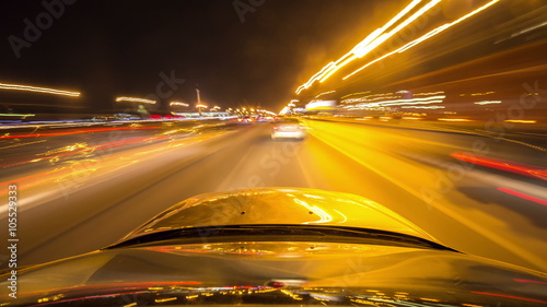 Pov night driving hyperlapse at a modern highway passing a series of tunnels.