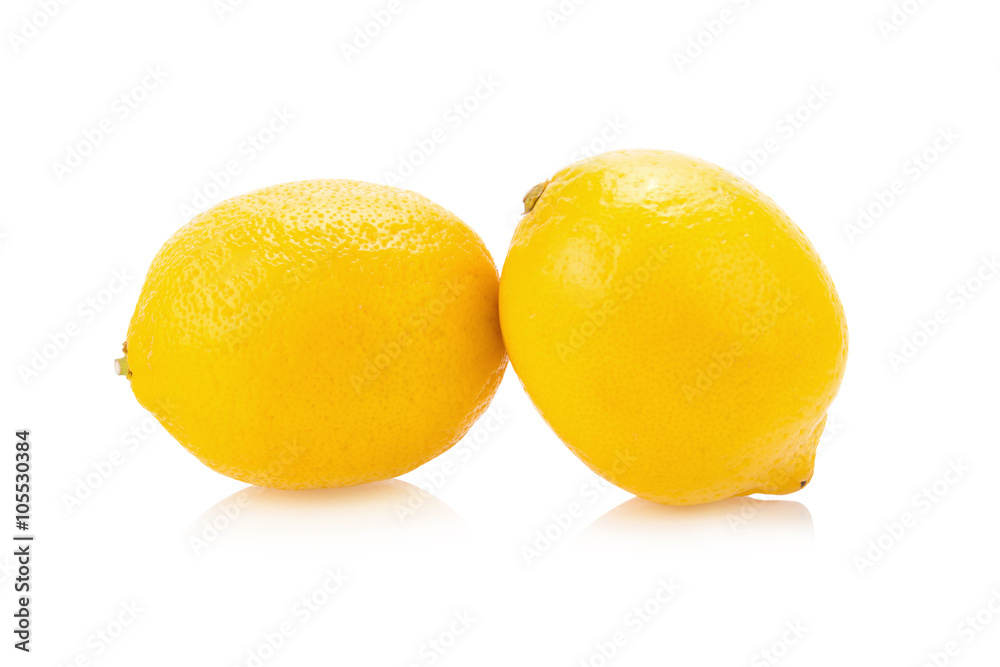 Yellow ripe lemon isolated on a white Yellow ripe lemon isolated on a white