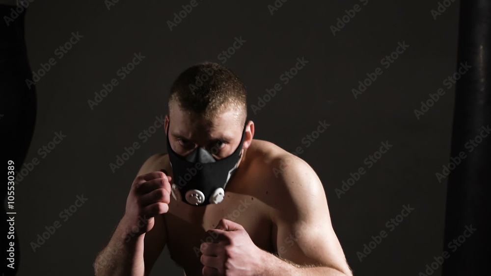 Terrible young man in a mask. Aggressive beats ahead Terrible young man in a mask. Aggressive beats ahead