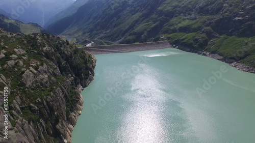 Aerial Footage: Flight over a lake in the Swiss alps, 4K, UHD photo