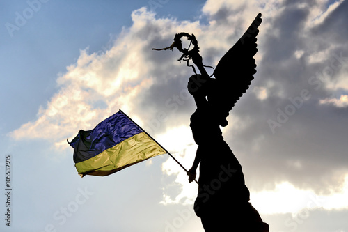 the silhouette of the monument of independence in Kharkov, Ukrai photo