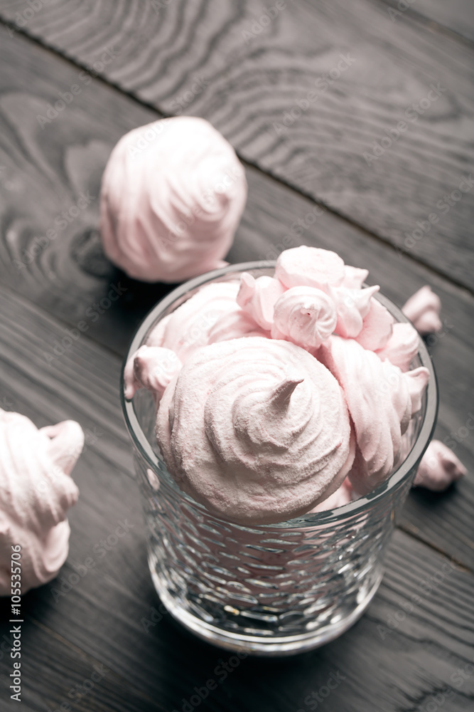 Delicious meringue on the dark table Delicious meringue on the dark table