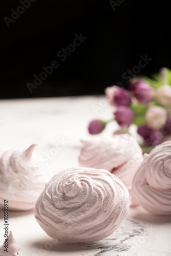 Delicious meringue on the light table © zakiroff