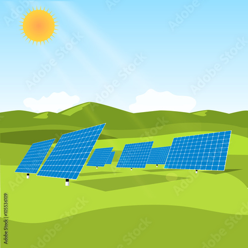 Solar panels in a field of grass