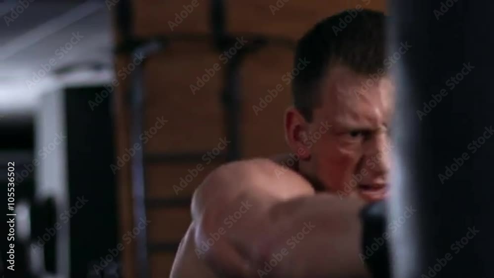 Handsome fit man boxing. Slow motion Handsome fit man boxing. Slow motion