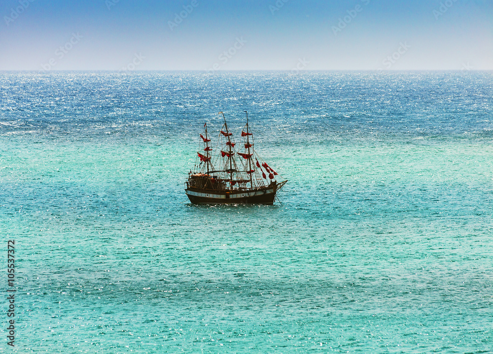 Old ship sailing in the sea