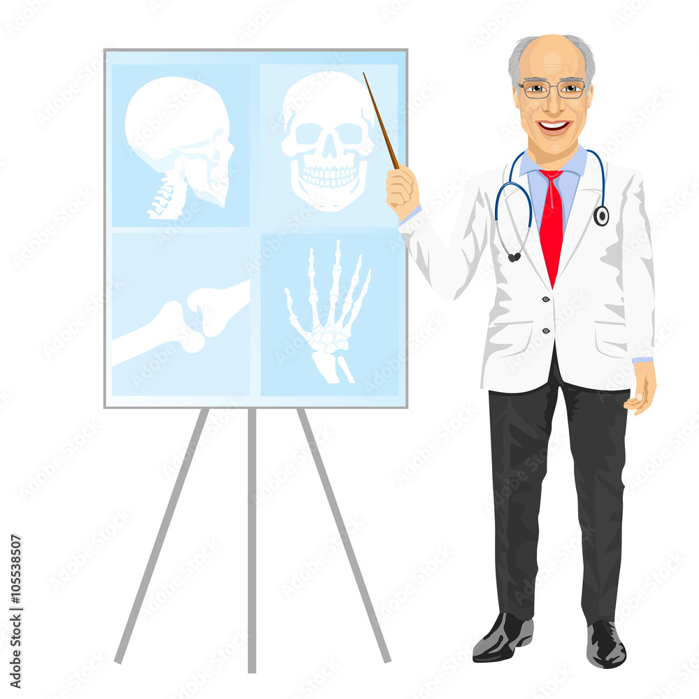 mature medical male doctor pointing on tomography mature medical male doctor pointing on tomography