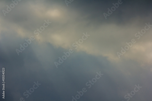 Rays of light shining through dark clouds © tum2282