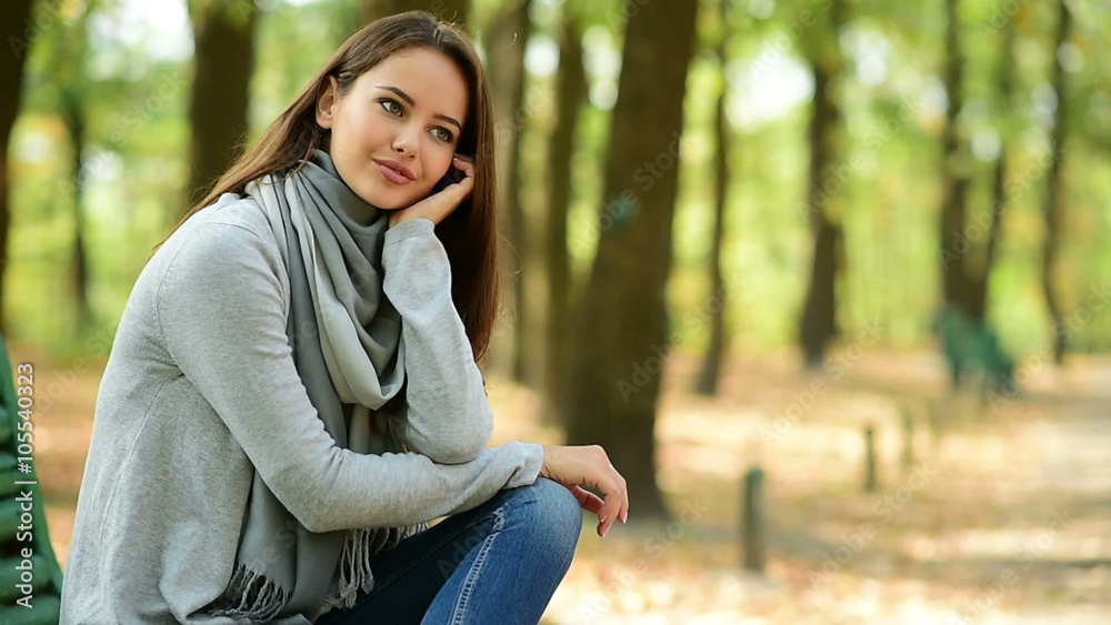 portrait of beautiful young woman outdoors in an autumn day portrait of beautiful young woman outdoors in an autumn day