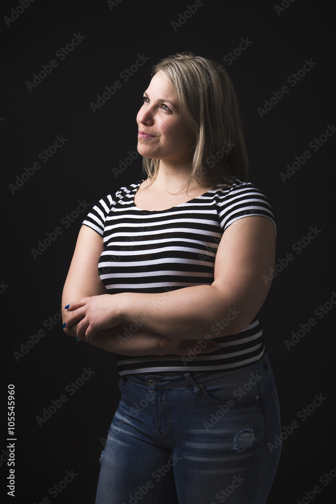 Portrait of beautiful woman over black background Portrait of beautiful woman over black background
