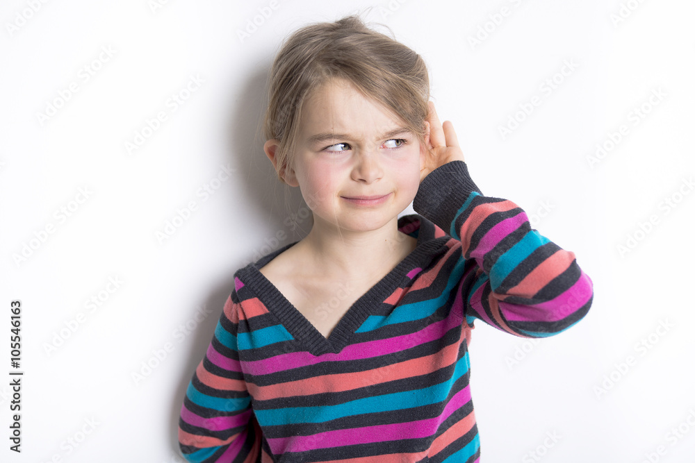 cute cheerful little girl portrait, isolated on gray background cute cheerful little girl portrait, isolated on gray background