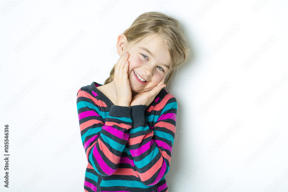 cute cheerful little girl portrait, isolated on gray background cute cheerful little girl portrait, isolated on gray background