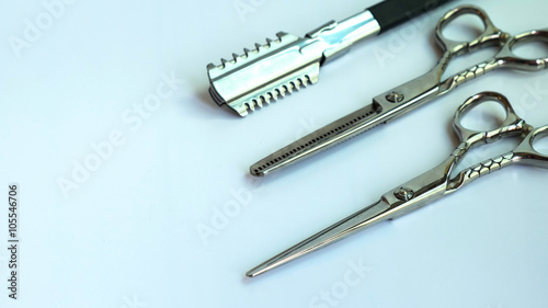 Scissors for cut hair on the white background.Tools for hair cut © truengtra