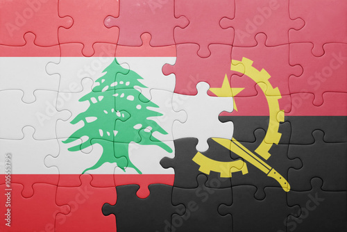 puzzle with the national flag of angola and lebanon photo