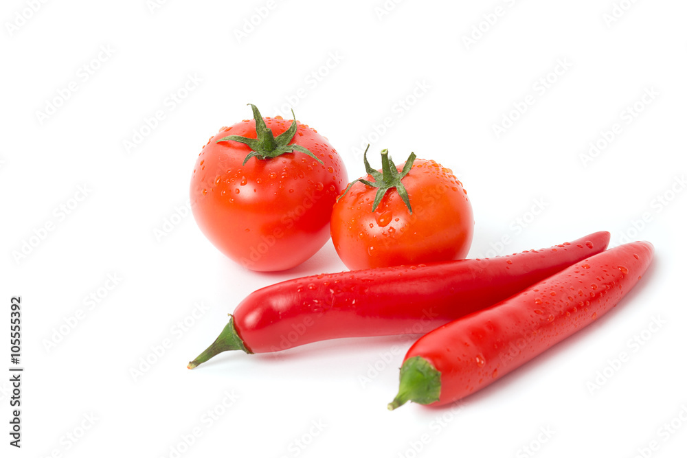 isolated tomato with pepper on white background isolated tomato with pepper on white background