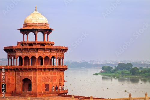 Red tower of Taj Mahal complex in Agra, India photo