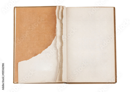 Open old book with torn page