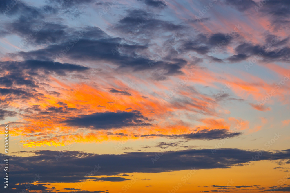 orange, blue and yellow colors sunset sky