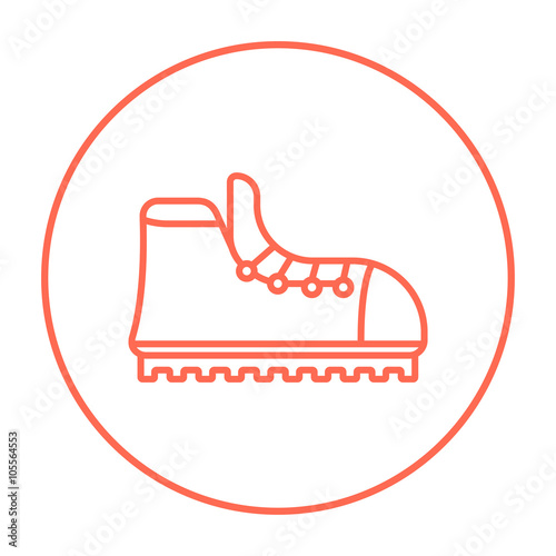 Hiking boot with crampons line icon.