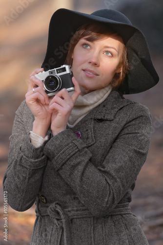 Female photographer with ha...