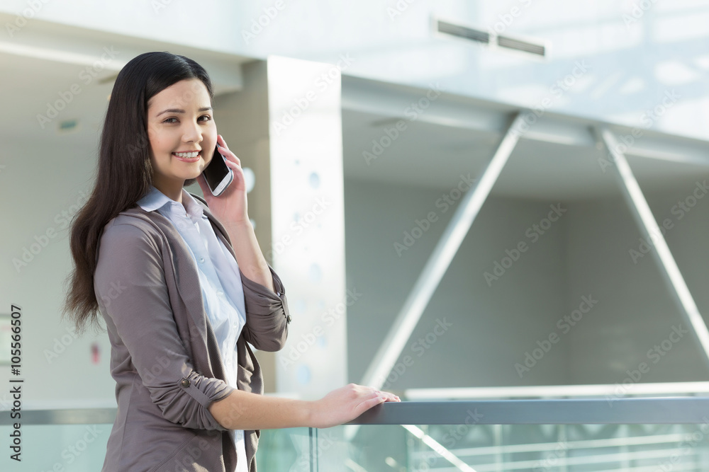 Attractive woman in office building Attractive woman in office building
