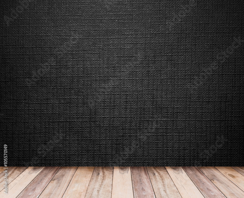 wooden floor and black wallpaper