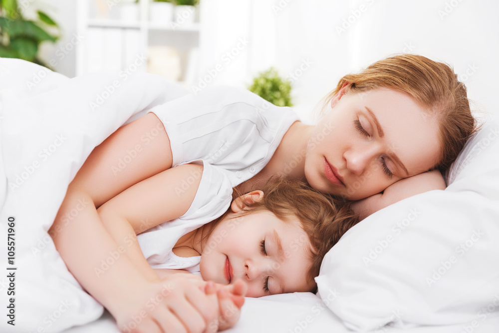 happy family mother and child sleeping in bed happy family mother and child sleeping in bed
