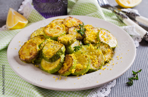 Fried zucchini with lemon zest