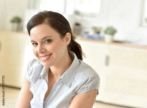 Portrait of smiling 40-year-old business woman Free Download Portrait of smiling 40-year-old business woman - GFXLoad