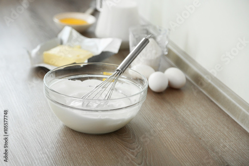 Cooking buttery cream on kitchen