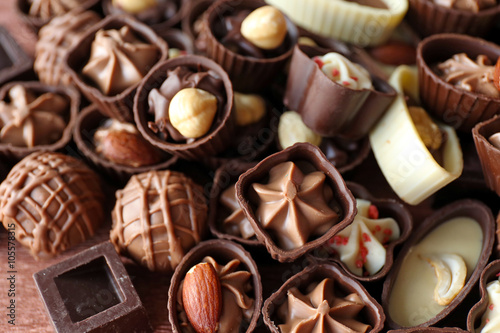 Delicious chocolate candies background, close up