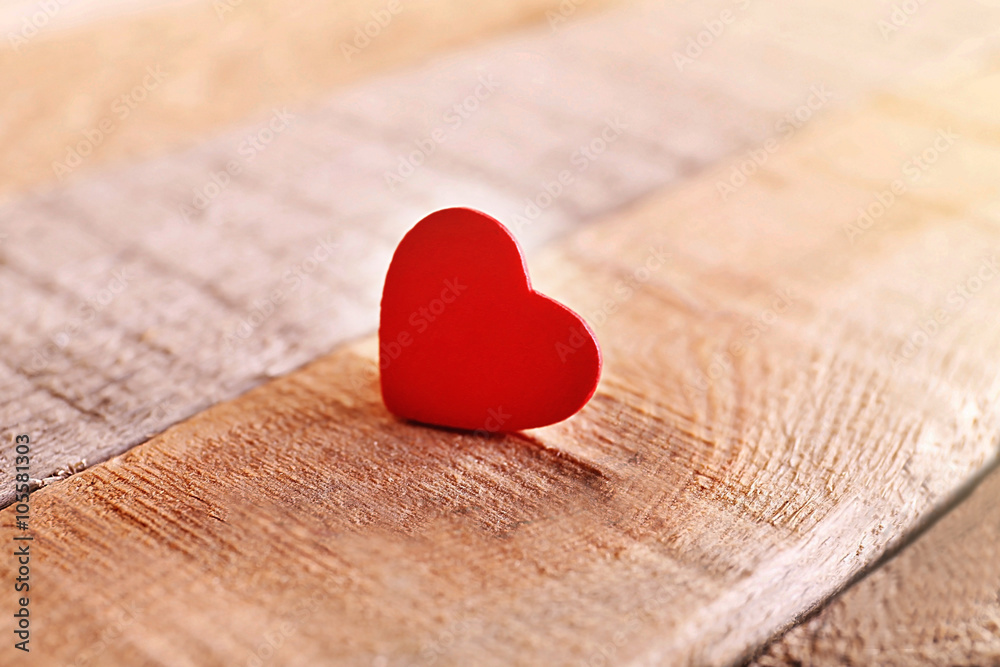 Valentine concept. Red heart on wooden background Valentine concept. Red heart on wooden background
