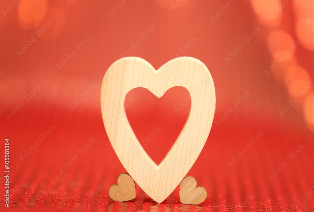 Valentines Heart on red fabric background Valentines Heart on red fabric background
