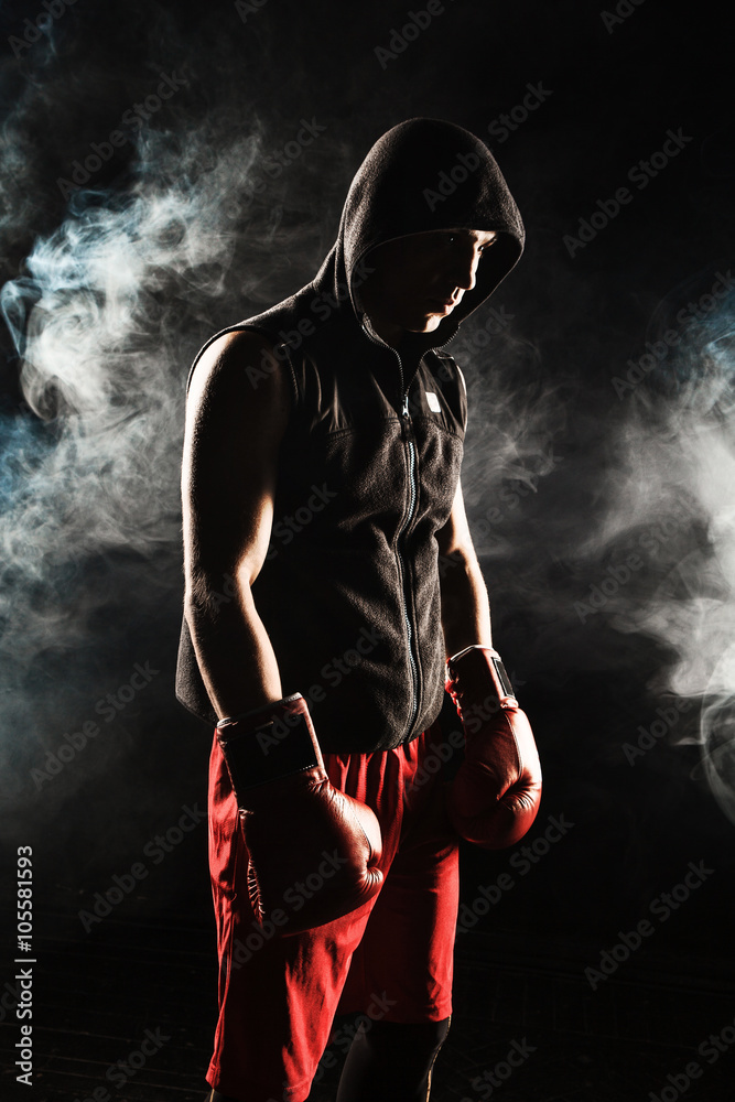 The young  man kickboxing 