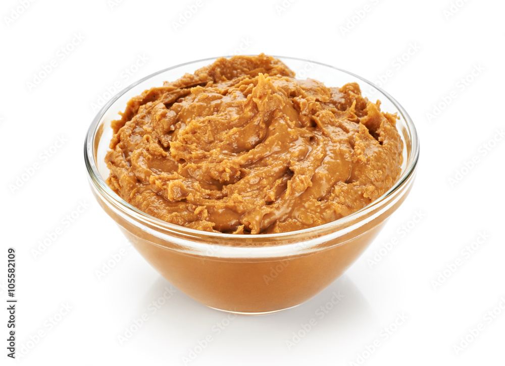 Bowl with peanut butter isolated on white background. Bowl with peanut butter isolated on white background.