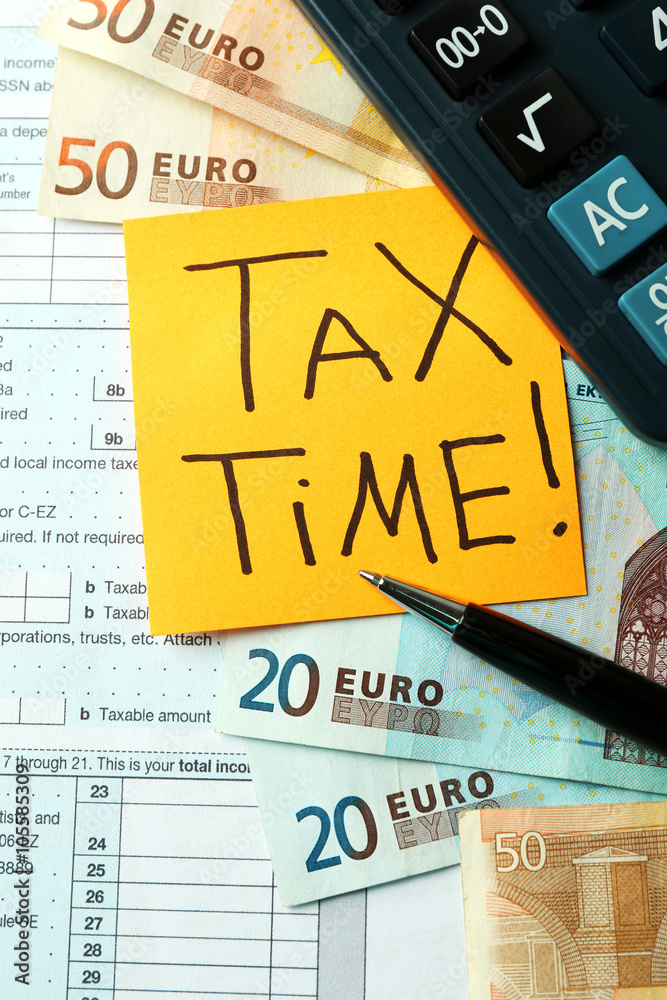 Money concept. Black calculator with cash and documents, close up Money concept. Black calculator with cash and documents, close up
