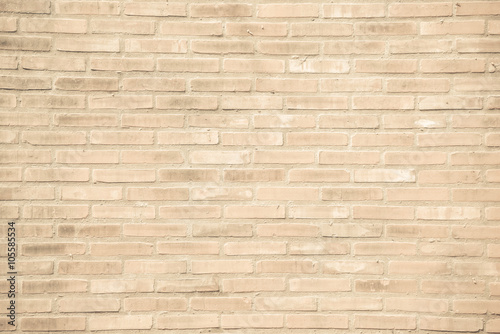 Beige grunge brick wall texture background