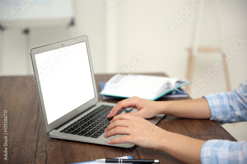 Work concept. Woman using laptop, close up