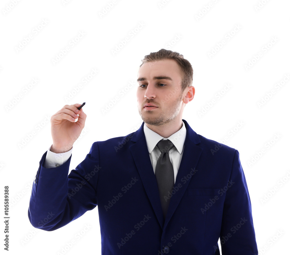 Handsome man writing with marker, isolated on white Handsome man writing with marker, isolated on white