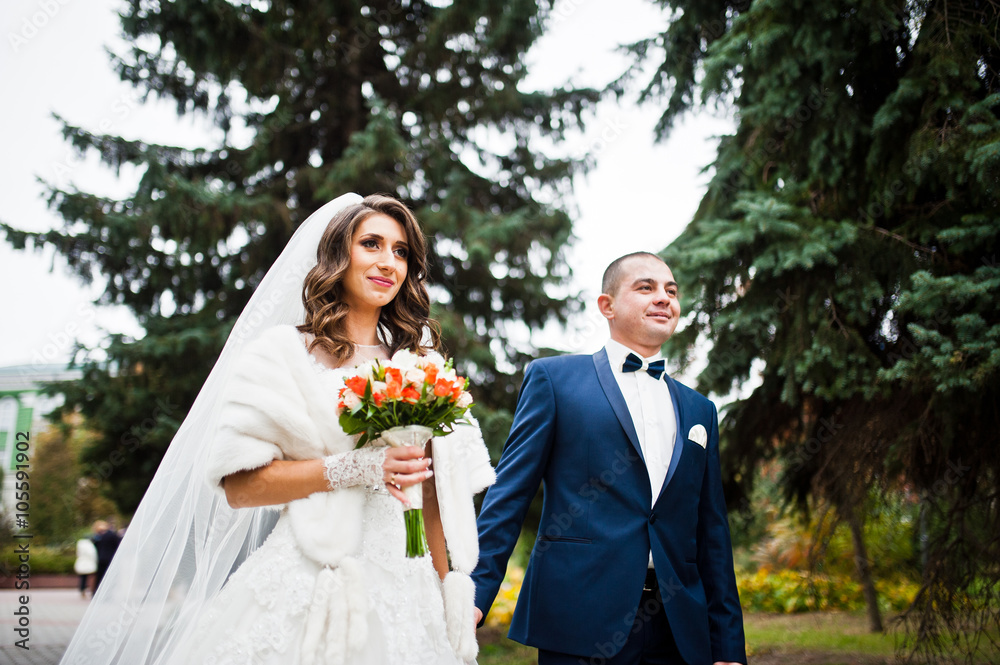 Happy wedding couple in love at autumn park Happy wedding couple in love at autumn park