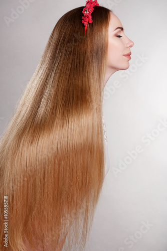 Beauty blonde woman with long straight hair studio isolated
